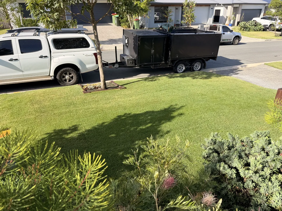 Enviro Garden Care & Odd Jobs mowing a residential lawn — lawn mowing Gold Coast, Pimpama